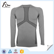 Ropa interior caliente térmica inconsútil del deporte del poliéster de nylon para el hombre